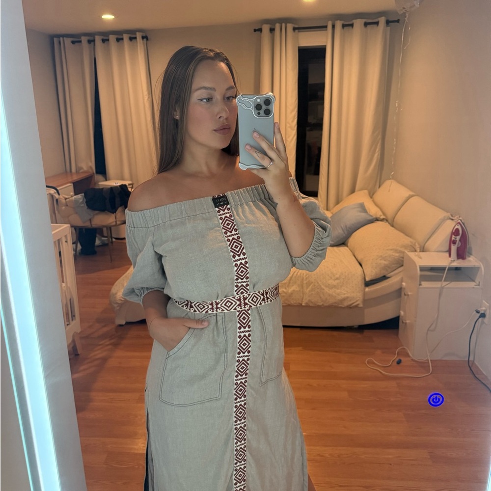 Dress made of natural linen with ornamental ribbons by EGLIT